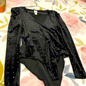 1 bodysuit , long sleeve